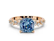 Solitaire Engagement Ring Setting for Fancy Blue Cushion Cut Center with Trailing Leaf Accent Band and Prong Head in Rose Gold