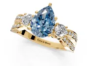 3 Stone Engagement Ring Setting for Fancy Blue Pear-Shaped Center with Pave Twist Band and Prong Head in Yellow Gold