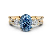 3 Stone Engagement Ring Setting for Fancy Blue Oval Center with Pave Split Shank and Prong Head in Yellow Gold