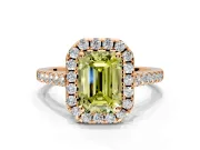 Halo Engagement Ring Setting for Fancy Yellow Emerald Cut Center with Narrowing Pave Band and Prong Head in Rose Gold