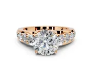 Solitaire Engagement Ring Setting for Round Cut Center with Graduated Shared Prongs and Prong Head in Rose Gold