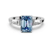 3 Stone Engagement Ring Setting for Fancy Blue Emerald Cut Center with Baguette Accents and Prong Head in Sterling Silver