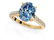 Solitaire Engagement Ring Setting for Fancy Blue Oval Center with Widening Pave Band and Claw Prong Head in Yellow Gold