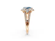 Halo Engagement Ring Setting for Fancy Blue Pear-Shaped Center with Two-Strand Split Shank and Prong Head in Rose Gold