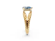 Halo Engagement Ring Setting for Fancy Blue Pear-Shaped Center with Rope Twist Split Shank and Prong Head in Yellow Gold