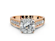 Solitaire Engagement Ring Setting for Cushion Cut Center with Round Cut Channel Band and Prong Head in Rose Gold