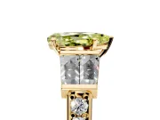 Channel-Set Engagement Ring Setting for Fancy Yellow Pear-Shaped Center with Baguette Band and Prong Head in Yellow Gold