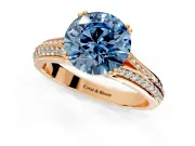 Solitaire Engagement Ring Setting for Fancy Blue Round Cut Center with Pave Rail Split Shank and Prong Head in Rose Gold