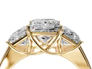 3 Stone Engagement Ring Setting for Princess Cut Center with Raised Basket Heads and Prong Head in Yellow Gold