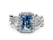 Halo Engagement Ring Setting for Fancy Blue Radiant Cut Center with Leaf Motif Split Shank and Prong Head in Platinum