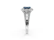 Halo Engagement Ring Setting for Fancy Blue Emerald Cut Center with Two-Strand Split Shank and Prong Head in Sterling Silver