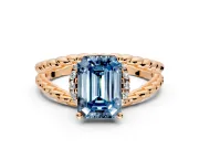 Halo Engagement Ring Setting for Fancy Blue Emerald Cut Center with Rope Twist Split Shank and Prong Head in Rose Gold