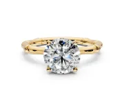 Solitaire Engagement Ring Setting for Round Cut Center with Bamboo Band and Prong Head in Yellow Gold