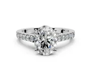 Solitaire Engagement Ring Setting for Oval Center with Crossover Accents and Prong Head in Platinum