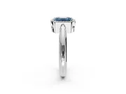Halo Engagement Ring Setting for Fancy Blue Emerald Cut Center with Tapered Plain Band and Prong Head in Sterling Silver