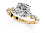 Cluster Engagement Ring Setting for Cushion Cut Center with Round Cut Accent Band and Prong Head in Yellow Gold