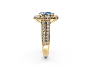 Large Accent Halo Engagement Ring Setting for Fancy Blue Pear-Shaped Center with Pave Split Shank and Prong Head in Yellow Gold