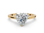 Solitaire Engagement Ring Setting for Heart-Shaped Center with Narrow Cathedral Band and Prong Head in Yellow Gold