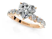 Shared-Prong Engagement Ring Setting for Heart-Shaped Center with Graduated Accents and Prong Head in Rose Gold