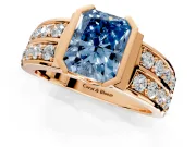 Bezel Engagement Ring Setting for Fancy Blue Radiant Cut Center with Wide Channel-Set Band and Bezel Head in Rose Gold