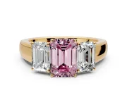 3 Stone Engagement Ring Setting for Fancy Pink Emerald Cut Center with Raised Basket Heads and Prong Head in Yellow Gold
