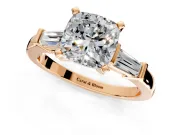 3 Stone Engagement Ring Setting for Cushion Cut Center with Channel Baguette Accents and Prong Head in Rose Gold