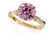 Side Accent Engagement Ring Setting for Fancy Pink Round Cut Center with Accent Shoulders and Prong Head in Yellow Gold