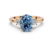 3 Stone Engagement Ring Setting for Fancy Blue Oval Center with Wide Plain Band and Prong Head in Rose Gold