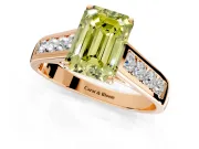 Solitaire Engagement Ring Setting for Fancy Yellow Emerald Cut Center with Round Cut Channel Band and Prong Head in Rose Gold