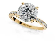 Solitaire Engagement Ring Setting for Round Cut Center with Fine Pave Narrow Band and Prong Head in Yellow Gold
