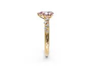 Cluster Engagement Ring Setting for Fancy Pink Pear-Shaped Center with Round Cut Accent Band and Prong Head in Yellow Gold