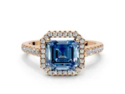 Halo Engagement Ring Setting for Fancy Blue Asscher Cut Center with Narrowing Pave Band and Prong Head in Rose Gold