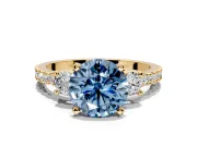 3 Stone Engagement Ring Setting for Fancy Blue Round Cut Center with Round Cut Side Accents and Prong Head in Yellow Gold