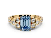 Cluster Engagement Ring Setting for Fancy Blue Emerald Cut Center with Bezel Accent Clusters and Prong Head in Yellow Gold