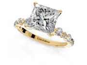 Solitaire Engagement Ring Setting for Princess Cut Center with Alternating Size Accents and Prong Head in Yellow Gold
