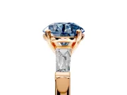 3 Stone Engagement Ring Setting for Fancy Blue Round Cut Center with Tapered Baguettes, Plain Band and Prong Head in Rose Gold