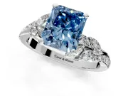 Solitaire Engagement Ring Setting for Fancy Blue Radiant Cut Center with Marquise Accent Twist Band and Prong Head in White Gold