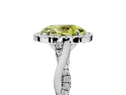 Halo Engagement Ring Setting for Fancy Yellow Oval Center with Twist Band and Prong Head in Sterling Silver