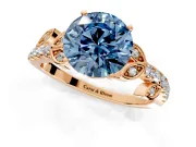 Leaf Motif Engagement Ring Setting for Fancy Blue Round Cut Center with Pave Band and Prong Head in Rose Gold
