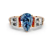 Channel-Set Engagement Ring Setting for Fancy Blue Pear-Shaped Center with Baguette Band and Prong Head in Rose Gold