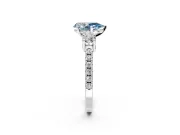 3 Stone Engagement Ring Setting for Fancy Blue Pear-Shaped Center with Round Cut Side Accents and Prong Head in Sterling Silver