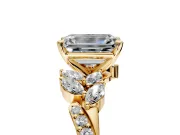 Solitaire Engagement Ring Setting for Emerald Cut Center with Marquise Accent Twist Band and Prong Head in Yellow Gold
