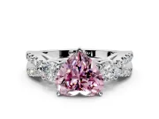 3 Stone Engagement Ring Setting for Fancy Pink Heart-Shaped Center with Pave Split Shank and Prong Head in Platinum