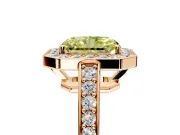 Bezel-Framed Halo Engagement Ring Setting for Fancy Yellow Radiant Cut Center with Pave Band and Prong Head in Rose Gold