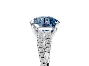 Solitaire Engagement Ring Setting for Fancy Blue Round Cut Center with Twisted Pave Split Shank and Prong Head in Platinum