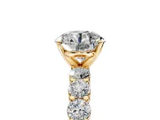 Shared-Prong Engagement Ring Setting for Round Cut Center with Graduated Accents and Prong Head in Yellow Gold