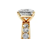 Solitaire Engagement Ring Setting for Radiant Cut Center with Channel-Set Accents and Prong Head in Yellow Gold