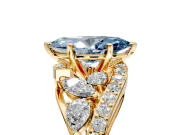 Halo Engagement Ring Setting for Fancy Blue Marquise Center with Marquise and Pave Bypass Band and Prong Head in Yellow Gold