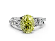 Leaf Motif Engagement Ring Setting for Fancy Yellow Oval Center with Pave Band and Prong Head in Platinum