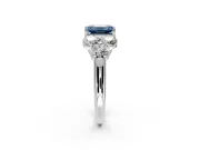 Cluster Engagement Ring Setting for Fancy Blue Emerald Cut Center with Round Cut Accent Frame and Prong Head in Sterling Silver